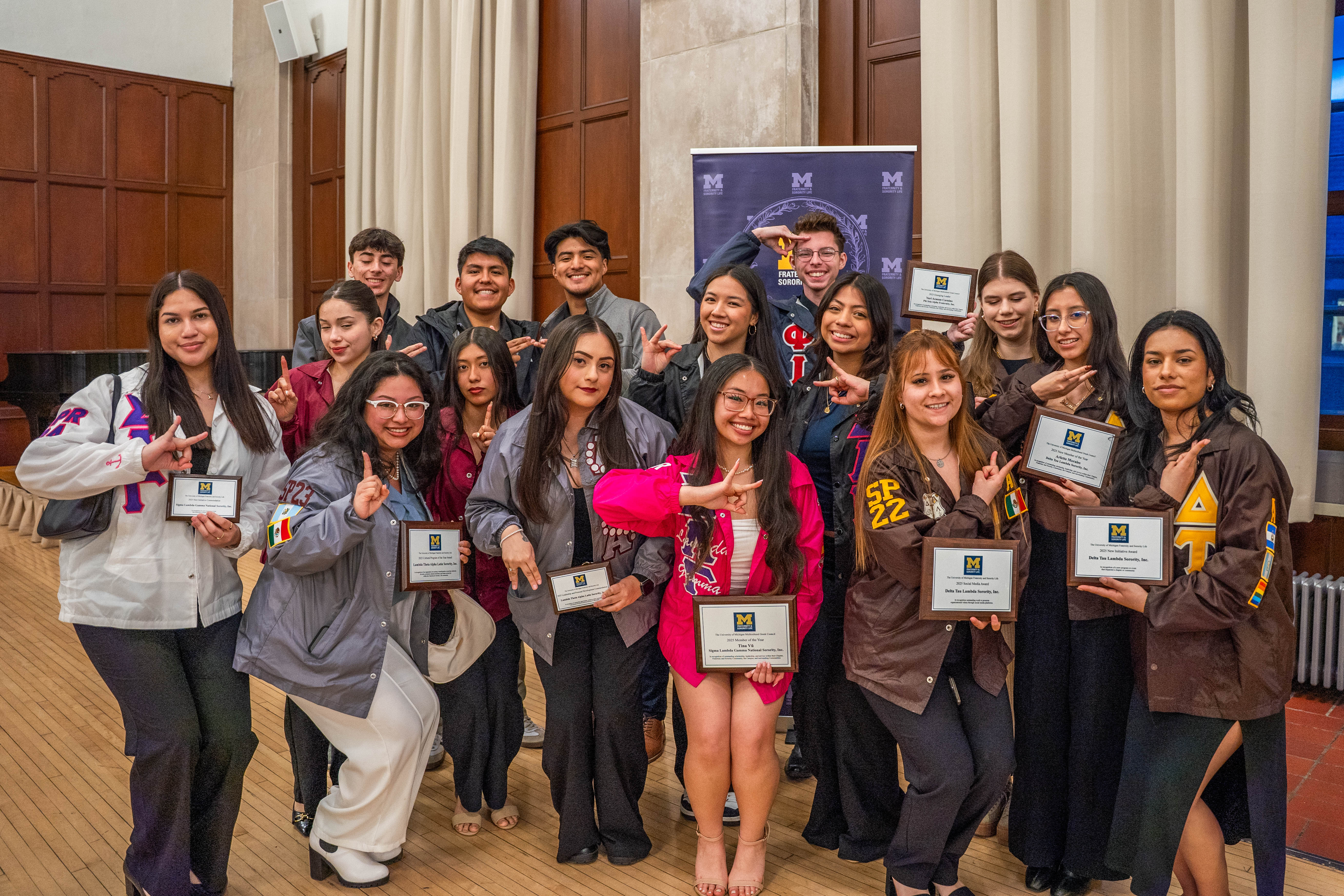 MGC members at Awards night holding award